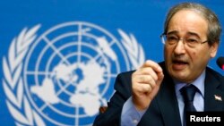 叙利亚副外长梅达德2月14日在联合国位于日内瓦的欧洲总部对媒体讲话