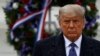 President Donald Trump participates in a Veterans Day wreath laying ceremony at the Tomb of the Unknown Soldier at Arlington National Cemetery in Arlington, Va., Nov. 11, 2020.