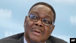 FILE - Malawi's President Peter Mutharika is pictured at the Institute of Peace in Washington, Aug. 6, 2014.