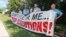 FILE - Protesters hold a sign against the death penalty outside the governor's mansion in Oklahoma City, June 18, 2013, protesting the execution of an inmate. 