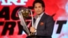Former Indian cricketer and brand ambassador of the International Cricket Council's (ICC) Cricket World Cup 2015 Sachin Tendulkar holds the ICC Cricket World Cup 2011 trophy during a promotional event in Mumbai, India, Feb. 7, 2015. 