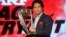 Former Indian cricketer and brand ambassador of the International Cricket Council's (ICC) Cricket World Cup 2015 Sachin Tendulkar holds the ICC Cricket World Cup 2011 trophy during a promotional event in Mumbai, India, Feb. 7, 2015. 