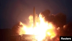 FILE - A missile is launched during testing at an unidentified location in North Korea, in this undated image provided by KCNA, Aug. 7, 2019. 