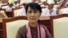 Burma's opposition leader Aung San Suu Kyi attends a regular session of the parliament in Naypyitaw, August 14, 2012.