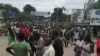Protesters march toward the Malawi Electoral Commission office in Blantyre, Malawi, Feb. 13, 2020, intending to shutter the entrance gate. (Lameck Masina/VOA)