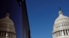 FILE - The U.S. Capitol dome and its reflection are seen in Washington, Jan. 15, 2020.