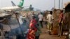 Christian refugees living in makeshift shelters near the airport in Bangui, Central African Republic, Tuesday Jan. 28, 2014, as they try to escape from the deepening divisions between the country's Muslim minority and Christian majority. Christian refug