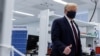 Trump Wears Mask, Voices Hope for Coronavirus Vaccine