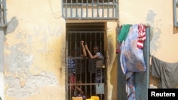 Inmates are seen at the Mogadishu central cell in Mogadishu, Somalia, July 20, 2019. 