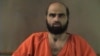 Nidal Malik Hasan is pictured in an undated police handout photograph.