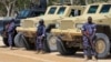 FILE - African Union (AU) soldiers stand with their armored vehicles near a checkpoint in Mogadishu, Somalia, Feb. 7, 2017. 