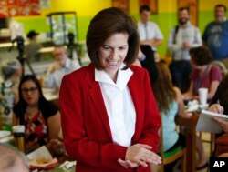 FILE - Nevada Democrat Catherine Cortez Masto, shown campaigning at a restaurant in May, has won the U.S. Senate seat being vacated by Harry Reid.