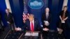 President Donald Trump speaks about the coronavirus in the James Brady Briefing Room, in Washington, March 26, 2020.