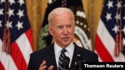 美国总统拜登在白宫的一次记者会上 （路透社照片）