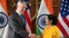 Indian Minister of External Affairs Sushma Swaraj shakes hands with U.S. Defense Secretary James Mattis before the start of the 2+2 meeting at the Ministry of External Affairs in New Delhi, Sept. 6, 2018. 
