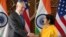 Indian Minister of External Affairs Sushma Swaraj shakes hands with U.S. Defense Secretary James Mattis before the start of the 2+2 meeting at the Ministry of External Affairs in New Delhi, Sept. 6, 2018. 