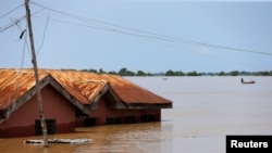 Une maison partiellement immergée dans la ville de Lokoja, dans l’État de Kogi, au Nigeria, le 17 septembre 2018.
