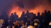 Protesters clash with police in central Kyiv, Ukraine, early Monday, Jan. 20, 2014.