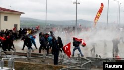 Security forces use water cannons to disperse protesters outside a courthouse in Silivri, where a hearing on people charged with attempting to overthrow Prime Minister Tayyip Erdogan's Islamist-rooted government is due to take place, Apr. 8, 2013.