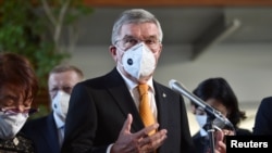 国际奥委会主席巴赫2020年11月16日在东京见记者（路透社）