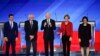 From left, Democratic presidential candidates Pete Buttigieg, Sen. Bernie Sanders, Joe Biden, Elizabeth Warren, and Amy Klobuchar, are seen ahead of their primary debate at Saint Anselm College in Manchester, New Hampshire, Feb. 7, 2020. 