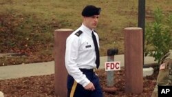 FILE - Army Sgt. Bowe Bergdahl leaves a courtroom after a pretrial hearing in Fort Bragg, NC., Monday, Nov. 14, 2016.