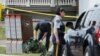 Police continue to search for evidence after a shooting in a residential neighborhood of the eastern city of Moncton, New Brunswick, June 5, 2014.