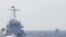 FILE - Ships of Chinese Coast Guard are seen near Chinese oil rig Haiyang Shi You 981 in the South China Sea, about 210 km (130 miles) off shore of Vietnam, May 14, 2014. 