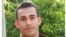 Iranian Kurdish dissident Ramin Hossein Panahi, who faces execution in Iran for membership in the Kurdish nationalist group Komala, appears in this undated photo.