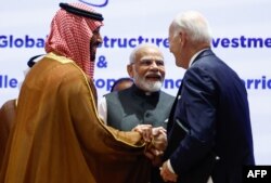 از راست به چپ: جو بایدن رئیس جمهوری ایالات متحده، نارندرا مودی نخست‌وزیر هند، و محمد بن سلمان ولیعهد پادشاهی عربستان سعودی
