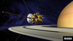 An artists concept of Cassini during the Saturn Orbit Insertion maneuver, just after the main engine has begun firing. 