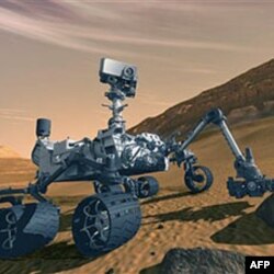Curiosity tədqiqat aparatı Mars planetində həyatın olub olmamasını araşdıracaq (video)