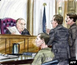 "American Taliban" John Walker Lindh with his attorney George Harris, right, and U.S. Attorney Randy Bellows, second right, appear before Judge T.S. Ellis III Feb. 15, 2002, in the Albert V. Bryan United States Courthouse in Alexandria, Va.