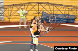 Graduate student Elizabeth Weiner coordinates operations with pilot Colin Gore during flight tests. (Earl Zubkoff/Courtesy University of Maryland)