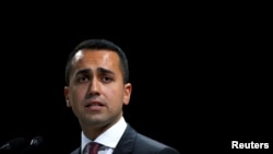 FILE - Italian Minister of Labor and Industry Luigi Di Maio speaks at the Italian Business Association Confcommercio meeting in Rome, June 7, 2018.