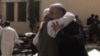 Friends and relatives of victims grieve at the scene of a bomb blast outside a hospital in Quetta, Pakistan, Aug. 8, 2016. 