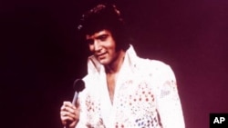 FILE - Elvis Presley performing in 1973.