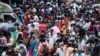 People walk at a crowded market amid the spread of the coronavirus disease (COVID-19) in Mumbai, India, Aug. 11, 2021.
