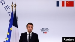 法国总统马克龙（Emmanuel Macron）2023年4月5日抵达北京后发表演讲。（路透社）