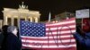 Protesters attend an anti-Trump rally in front of the Brandenburg Gate in Berlin, Germany, Jan. 20, 2017. 