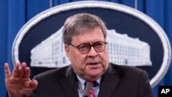 Attorney General William Barr speaks during a news conference, Dec. 21, 2020 at the Justice Department in Washington. 