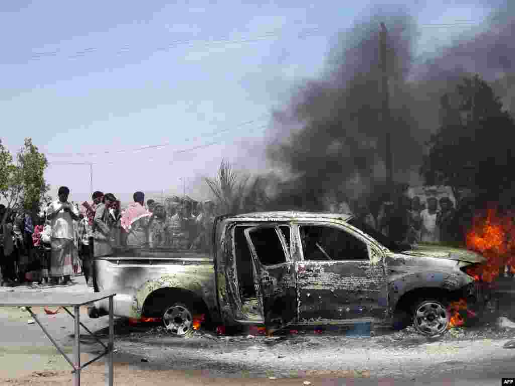The car of Lieutenant Colonel Mohammed al-Saidi after it was targeted by a suicide bomber in the southern Yemeni city of Ataq. A suicide bomber killed the army intelligence officer when he detonated his explosive-laden car in a market, a security official said.