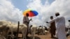 Men are seen at a livestock market, ahead of Eid al-Adha, amid the spread of the coronavirus disease (COVID-19), in Abuja, Nigeria, July 29, 2020. 