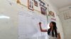 A local election official counted the votes at Sla Kaet polling station in Chrey Koung, Battambang province, Cambodia, June 4, 2017. (Ith Sotheouth/VOA Khmer)