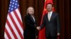 U.S. Secretary of State Hillary Rodham Clinton, left, and Chinese Foreign Minister Yang Jiechi, right, shake hands during her visit to Beijing, Sept. 4, 2012. 