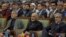FILE - Afghan President Ashraf Ghani, center, former President Hamid Karzai, left, and Afghan chief executive Abdullah Abdullah, right, attend during a ceremony marking the first anniversary of the death of Former Afghan Vice President Marshal Mohammed Qa