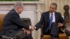 President Barack Obama and Israeli Prime Minister Benjamin Netanyahu shake hands during their meeting in the Oval Office of the White House in Washington, Monday, March 3, 2014.