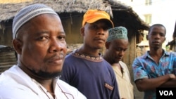 Mombasa Republican Council (MRC) Spokesman Mohammed Rashid Mraja, (left), with supporters in Mombasa, July 20, 2012. (Jill Craig/VOA)