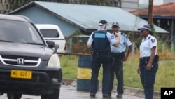Solomon Islands police and Australian Federal Police man road blocks in Honiara, Solomon Islands, Dec. 6, 2021.