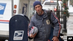 Meskipun merugi miliaran dolar per tahun, Kantor Pos AS akan tetap mengantar surat hari Sabtu (foto: dok). 